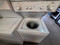 GE SPACE MAKER 24 INCH LAUNDRY CENTER BY WHIRLPOOL WASHER  7 CYCLE  3 TEMPERATURE 3 WATER LEVELS DRYER 4 CYCLE HIGH HEAT AUTO DRY LOW HEAT AUTO DRY HIGH HEAT TIMED DRY PLUS AIR FLUFF LOCATED IN OUR PORTLAND OREGON APPLIANCE STORE SKU 23717