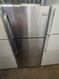 FRIGIDAIRE 18 CUBIC FOOT REFRIGERATOR TOP FREEZER FULL WIDTH GLASS SHELVES 2 CRISPER DRAWERS UP FRONT TEMPERATURE CONTROL STAINLESS LOCATED IN OUR PORTLAND OREGON APPLIANCE STORE SKU 23817