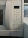 Whirlpool WMH31017HW 1.7 cu. ft. Over-the-Range Microwave Oven with 1,000 Watts, Two-Speed 300 CFM Venting System, Add 30 Seconds, Turntable Plate, and Cooktop Lighting: White LOCATED IN OUR PORTLAND OREGON APPLIANCE STORE SKU 23862