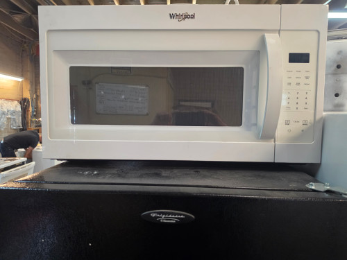 Whirlpool WMH31017HW 1.7 cu. ft. Over-the-Range Microwave Oven with 1,000 Watts, Two-Speed 300 CFM Venting System, Add 30 Seconds, Turntable Plate, and Cooktop Lighting: White LOCATED IN OUR PORTLAND OREGON APPLIANCE STORE SKU 23862