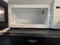 Whirlpool WMH31017HW 1.7 cu. ft. Over-the-Range Microwave Oven with 1,000 Watts, Two-Speed 300 CFM Venting System, Add 30 Seconds, Turntable Plate, and Cooktop Lighting: White LOCATED IN OUR PORTLAND OREGON APPLIANCE STORE SKU 23862