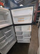 WHIRLPOOL GOLD SERIES 19 CUBIC FOOT REFRIGERATOR WITH ICE MAKER GLASS SHELVES 2 CRISPER DRAWERS 1 DELI DRAWER PULL OUT FREEZER TRAY STAINLESS WITH BLACK CABINET LOCATED IN OUR PORTLAND OREGON APPLIANCE STORE SKU 24026