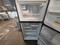 WHIRLPOOL GOLD SERIES 19 CUBIC FOOT REFRIGERATOR WITH ICE MAKER GLASS SHELVES 2 CRISPER DRAWERS 1 DELI DRAWER PULL OUT FREEZER TRAY STAINLESS WITH BLACK CABINET LOCATED IN OUR PORTLAND OREGON APPLIANCE STORE SKU 24026
