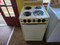 KENMORE FREESTANDING 20 INCH ELECTRIC RANGE COIL BURNERS 3 SMALL 1 LARGE MANUAL CLEAN OVEN ALMOND LOCATED IN OUR PORTLAND OREGON APPLIANCE STORE SKU 24041