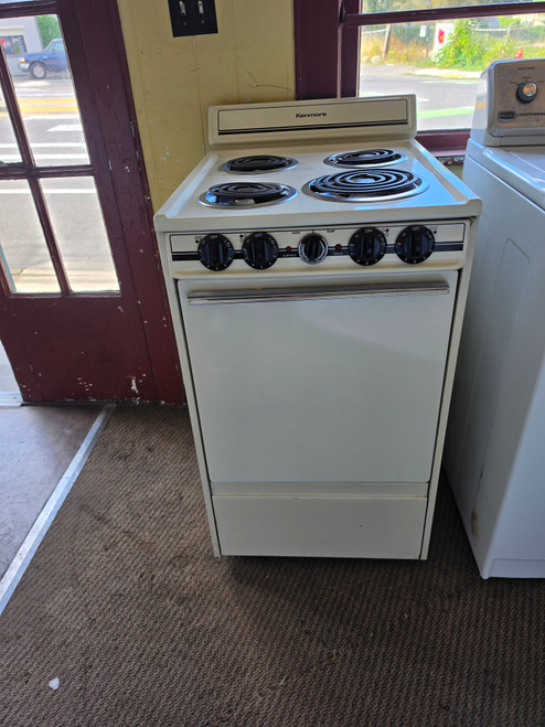 KENMORE FREESTANDING 20 INCH ELECTRIC RANGE COIL BURNERS 3 SMALL 1 LARGE MANUAL CLEAN OVEN ALMOND LOCATED IN OUR PORTLAND OREGON APPLIANCE STORE SKU 24041