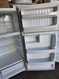 HOTPOINT 16 CUBIC FOOT REFRIGERATOR TOP FREEZER ADJUSTABLE WIRE SHELVES SINGLE CRISPER DRAWER WIRE SHELF IN FREEZER WHITE LOCATED IN OUR PORTLAND OREGON APPLIANCE STORE SKU 24053