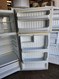 HOTPOINT 16 CUBIC FOOT REFRIGERATOR TOP FREEZER ADJUSTABLE WIRE SHELVES SINGLE CRISPER DRAWER WIRE SHELF IN FREEZER WHITE LOCATED IN OUR PORTLAND OREGON APPLIANCE STORE SKU 24053