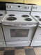 Whirlpool 30 Inch Freestanding Electric Range with 4 Coil Elements, 4.8 cu. ft. Oven Capacity, Storage Drawer, Self Cleaning Technology, Keep Warm Setting and Upswept Spill Guard™ Cooktop: White LOCATED IN OUR PORTLAND OREGON APPLIANCE STORE SKU 24057