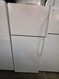 WHIRLPOOL 16 CUBIC FOOT REFRIGERATOR TOP FEEZER ADJUSTABLE WIRE SHELVES LARGE CRISPER DRAWER WITH GLASS COVER WHITE LOCATED IN OUR PORTLAND OERGON APPLIANCE STORE SKU 24069