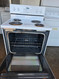 Whirlpool 30 Inch Freestanding Electric Range with 4 Coil Elements, 2,600 Watts, 4.8 cu. ft. Traditional Oven, Self Cleaning System and Accu-Bake Temperature Management System: White LOCATED IN OUR PORTLAND OREGON APPLIANCE STORE SKU 24082