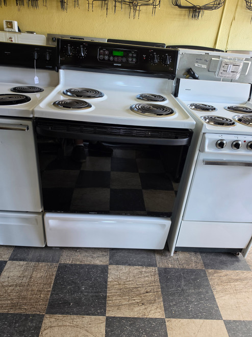 HOTPOINT 30 INCH FREESTANDING ELECTRIC RANGE COIL BURNERS 2 LARGE 2 SMALL SELF CLEANING OVEN HI LO BROIL OPTION WHITE WITH BLACK GLASS DOOR NO WINDOW LOCATED IN OUR PORTLAND OREGON APPLIANCE STORE SKU 24090