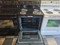 GE 30 INCH FREESTANDING ELECTRIC RANGE COIL BURNERS 2 LARGE 2 SMALL HI LO BROIL SETTING SELF CLEANING OVEN BLACK LOCATED IN OUR PORTLAND OREGON APPLIANCE STORE SKU 24085