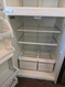 ROPER 18 CUBIC FOOT REFRIGERATOR TOP FREEZER WIRE SHELVES 2 CRISPER DRAWERS WITH GLASS COVER WIRE SHELF IN FREEZER WHITE LOCATED IN OUR PORTLAND OREGON APPLIANCE STORE SKU 24156