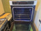 KitchenAid " Double Electric 8.6 cu. ft. Wall Oven with True Convection Ovens, 3 Oven Racks Each, Even Heat Technology, Clean Bake Hidden Element and Blue-Enamel Interior: White LOCATED IN OUR PORTLAND OREGON APPLIANCE STORE SKU 24162