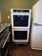KitchenAid " Double Electric 8.6 cu. ft. Wall Oven with True Convection Ovens, 3 Oven Racks Each, Even Heat Technology, Clean Bake Hidden Element and Blue-Enamel Interior: White LOCATED IN OUR PORTLAND OREGON APPLIANCE STORE SKU 24162