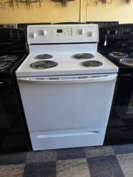 WHIRLPOOL 30 INCH FREESTANDING ELECTRIC RANGE COIL BURNERS 2 LARGE 2 SMALL SELF CLEANING OVEN WHITE LOCATED IN OUR PORTLAND OREGON APPLIANCE STORE SKU 24165