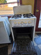 VINTAGE WEDGEWOOD 21 INCH FREESTANDING GAS RANGE 4 BURNER MANUAL CLEAN OVEN BOTTOM BROILER DRAWER WHITE LOCATED IN OUR PORTLAND OREGON APPLIANCE STORE SKU 24172