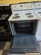 WHIRLPOOL 30 INCH FREESTANDING ELECTRIC RANGE COIL BURNERS 2 LARGE 2 SMALL SELF CLEANING OVEN WHITE LOCATED IN OUR PORTLAND OREGON APPLIANCE STORE SKU 24182
