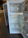 FRIGIDAIRE 18 CUBIC FOOT REFRIGERATOR TOP FREEZER ADJUSTABLE WIRE SHELVES 2 CRISPER DRAWERS GLASS COVER FULL WIDTH WIRE SHELF IN FEEZER WHITE LOCATED IN OUR PORTLAND OREGON APPLIANCE STORE SKU 24189