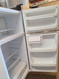 GE 17 CUBIC FOOT REFRIGERATOR TOP FREEZER WIRE SHELVES 2 CRISPER DRAWERS WHITE LOCATED IN OUR PORTLAND OREGON APPLIANCE STORE SKU 24196
