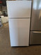 GE 17 CUBIC FOOT REFRIGERATOR TOP FREEZER WIRE SHELVES 2 CRISPER DRAWERS WHITE LOCATED IN OUR PORTLAND OREGON APPLIANCE STORE SKU 24196