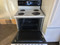 HOTPOINT 30 INCH FREESTANDING ELECTRIC RANGE COIL BURNERS 3 SMALL 1 LARGE MANUAL CLEAN WHITE WITH BLACK CONTROL PANEL LOCATED IN OUR PORTLAND OREGON APPLIANCE STORE SKU 24209