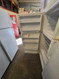 WHIRLPOOL 14 CUBIC FOOT RERIGERATOR TOP FREEZER WIRE SHELVES LARGE CRISPER DRAWER WIRE SHELF IN FREEZER WHITE LOCATED IN OUR PORTLAND OREGON APPLIANCE STORE SKU 24210