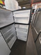 IKEA 18 CUBIC FOOT REFRIGERATOR BY WHIRLPOOL GLASS SHELVES GLASS CRISPER COVER WITH 2 DRAWERS STAINLESS FRONT BLACK  CABINET LOCATED IN OUR PORTLAND OREGON APPLIANCE STORE SKU 24223