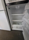 IKEA 18 CUBIC FOOT REFRIGERATOR BY WHIRLPOOL GLASS SHELVES GLASS CRISPER COVER WITH 2 DRAWERS STAINLESS FRONT BLACK  CABINET LOCATED IN OUR PORTLAND OREGON APPLIANCE STORE SKU 24223