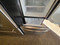 Amana 18.5 cu. ft. Bottom Freezer Refrigerator with 4 Half-Width Adjustable Spill saver Glass Shelves, Humidity Controlled Crisper Drawers, Temp Assure Freshness Controls, Gallon Door Storage COSMETIC ISSUE ON DOOR SEE PIC Stainless SKU 24226