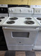 GE 30 INCH FREESTANDING ELECTRIC RANGE MANUAL CLEAN OVEN COIL BURNERS 2 LARGE 2 SMALL STORAGE DRAWER WHITE LOCATED IN OUR PORTLAND OREGON APPLIANCE STORE SKU 24229