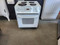 GE 27 INCH DROP IN ELECTRIC RANGE COIL BURNERS 3 SMALL 1 LARGE HI/LO BROIL OPTION SELF CLEANING OVEN WHITE LOCATED IN OUR PORTLAND OREGON APPLIANCE STORE SKU 24236