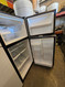 FRIGIDAIRE 20.6 cubic feet Top-freezer Shelving 4 half-width cantilevered Spill Safe glass shelves • Storage & Bins: 4 adjustable clear door bins, 1 fixed door bin, clear crispers, clear deli drawer, and a clear dairy door Ice Maker SKU 24253