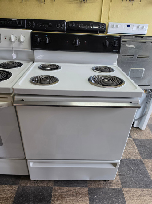HOTPOINT 30 INCH FREE STANDING ELECTIC RANGE MANUAL CLEAN COIL BURNERS 3 SMALL 1 LARGE WHITE LOCATED IN OUR PORTLAND OREGON APPLIANCE STORE SKU 24259