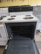 HOTPOINT 30 INCH FREE STANDING ELECTIC RANGE MANUAL CLEAN COIL BURNERS 3 SMALL 1 LARGE WHITE LOCATED IN OUR PORTLAND OREGON APPLIANCE STORE SKU 24259