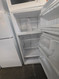 GE 18 CUBIC FOOT REFRIGERATOR TOP FREEZER UP FRONT CONTROL WIRE SHELVES 1 DELI DRAWER 2 CRISPER DRAWERS FULL WIDTH WIRE SHELF IN FREEZER WHITE LOCATED IN OUR PORTLAND OREGON APPLIANCE STORE SKU 24264