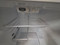 GE 18 CUBIC FOOT REFRIGERATOR TOP FREEZER UP FRONT CONTROL WIRE SHELVES 1 DELI DRAWER 2 CRISPER DRAWERS FULL WIDTH WIRE SHELF IN FREEZER WHITE LOCATED IN OUR PORTLAND OREGON APPLIANCE STORE SKU 24264