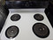 HOTPOIT 30 INCH FREESTANDING ELECTRIC RANGE MANUAL CLEAN OVEN COIL BURNERS 3 SMALL 1 LARGE STORAGE DRAWER WHITE LOCATED IN OUR PORTLAND OREGON APPIANCE STORE SKU 24265