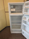 WHIRLPOOL 16 CUBIC FOOT REFIGERATOR TOP FREEZER WITH ICE MAKER 2 WIRE SHELVES GLASS CRISPER COVER WITH LARGE CRISPER DRYER COSMETIC ISSUES ON FREEZER DOOR AND HANDLE WHITE LOCATED IN OUR PORTLAND OREGON APPLIANCE STORE SKU 24267
