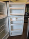 WHIRLPOOL 16 CUBIC FOOT REFIGERATOR TOP FREEZER WITH ICE MAKER 2 WIRE SHELVES GLASS CRISPER COVER WITH LARGE CRISPER DRYER COSMETIC ISSUES ON FREEZER DOOR AND HANDLE WHITE LOCATED IN OUR PORTLAND OREGON APPLIANCE STORE SKU 24267