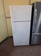 WHIRLPOOL 16 CUBIC FOOT REFIGERATOR TOP FREEZER WITH ICE MAKER 2 WIRE SHELVES GLASS CRISPER COVER WITH LARGE CRISPER DRYER COSMETIC ISSUES ON FREEZER DOOR AND HANDLE WHITE LOCATED IN OUR PORTLAND OREGON APPLIANCE STORE SKU 24267