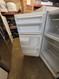 HOTPOINT 14 CUBIC FOOT REFRIGERATOR TOP FREEZER WIRE SHELVES 2 CRISPER DRAWERS COSMETIC ISSUES ON DOORS WHITE LOCATED IN OUR PORTLAND OREGON APPLIANCE STORE SKU 24276