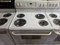 FRIGIDAIRE 30 INCH  FREESTANDING ELECTRIC RANGE COIL BURNERS 2 LARGE 2 SMALL SELF CLEANING OVEN DOOR GASKET IN WORN ON BOTTON SEE PIC WHITE LOCATED IN OUR PORTLAND OREGON APPLIANCE STORE SKU 24287