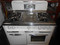 VINTAGE WEDGEWOOD 35 INCH FREE STANDING 4 BURNER GAS RANGE  WITH CENTER GRIDDLE BROILER DRAWER  WHITE LOCATED IN OUR PORTLAND OREGON APPLIANCE STORE