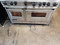 VIKING PROFESSIONAL 48 INCH FREE STANDING DOUBLE OVEN GAS RANGE 6 BURNER WITH CENTER GRIDDLE  AND CUTTING BOARD MANUAL CLEAN OVEN CONVECTION STAINLESS LOCATED IN OUR PORTLAND OREGON APPLIANCE STORE