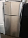 FRIGIDAIRE GALLERY SERIES 18 CUBIC FOOT REFRIGERATOR TOP FREEZER AUTOMATIC DEFROST FULL WIDTH ADJUSTABLE GLASS SHELVES 1  DELI DRAWER AND 2 CRISPER DRAWERS WIRE SHELF IN FREEZER STAINLESS LOCATED IN OIR PORTLAND OREGON APPLIANCE STORE