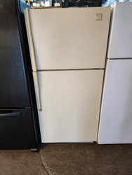 WHIRLPOOL 18 CUBIC FOOT REFRIGERATOR WITH TOP FREEZER ADJUSTABLE GLASS SHELVES 1 DELI  PAN AND 2 CRISPER DRAWERS BISQUE LOCATED IN OUR PORTLAND OREGON APPLIANCE STORE SKU 16335