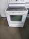 WHIRLPOOL GLASS TOP ELECTRIC RANGE 30 INCH FREE STANDING 4 BURNER 1 LARGE DUAL 1 LARGE 2 SMALL SELF CLEANING OVEN KEEP WARM SETTING DELAYED COOKING OPTION STORAGE  DRAWER WHITE LOCATED IN OUR PORTLAND OREGON APPLIANCE STORE SKU 16529