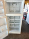 FRIGIDAIRE 21 CUBIC FOOT REFRIGERATOR TOP FREEZER GLASS SHELVES 2 HUMIDITY CONTROLLED CRISPEER DRAWERS WIRE SHELF IN FREEZER COSMETIC ISSUES  UNIT WORKS GOODS WHITE LOCATED IN OUR PORTLAND OREGON APPLIANCE STORE SKU 16748