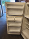 HOTPOINT 16 CUBIC FOOT REFRIGERATOR TOP FREEZER WIRE SHELVES LARGE SINGLE CRISPER DRAWER 2 DAIRY COMPARTMENTS IN TO DOOR WHITE LOCATED IN OUR PORTLAND OREGON APPLIANCE STORE SKU 16833